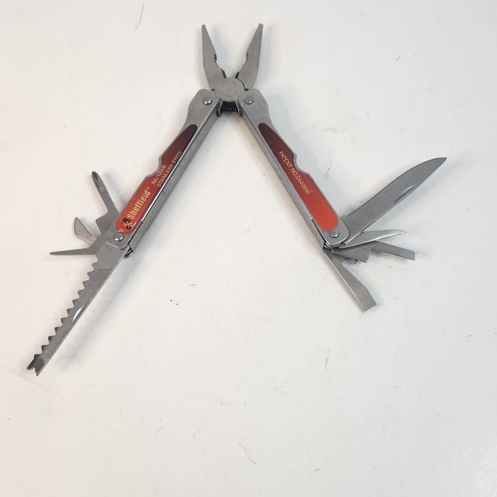 Sheffield Multi-Tool Utility Stainless Pliers + 9 blades, screw drivers. Misc.